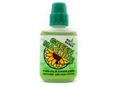 The Green Machine thin-film chain lube bottle, on a plain white background.